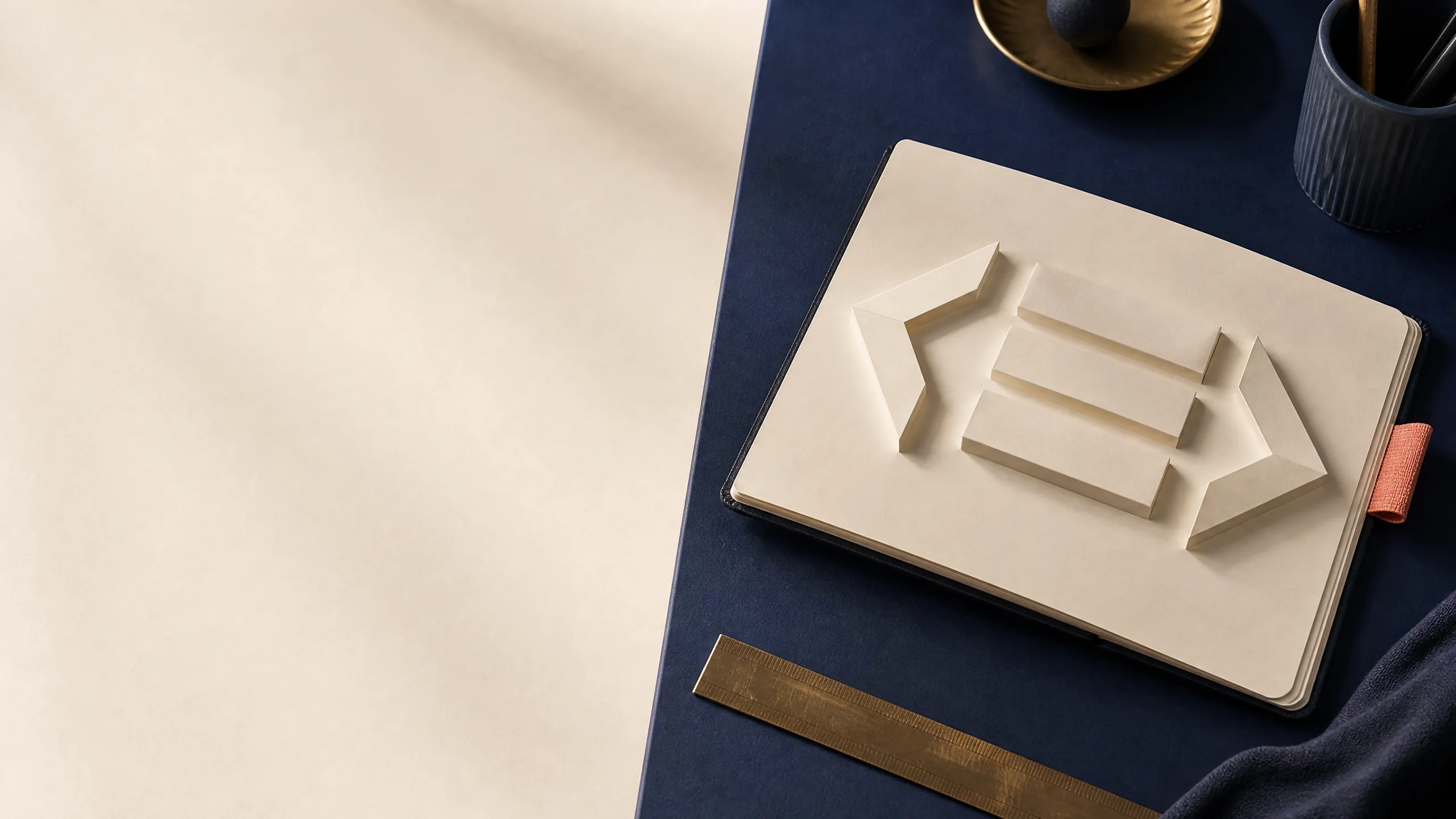 Editorial writing desk with abstract document blocks and a coral pencil tab